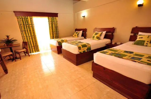 Hotel Casino Flamboyan Punta Cana room 3 beds