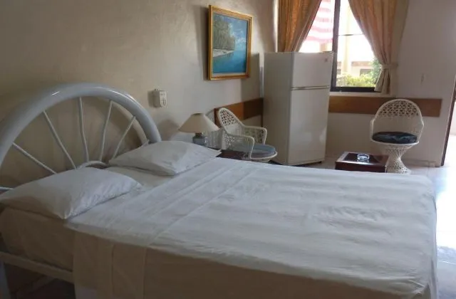 Hotel Garant Suites Boca Chica room 1 large bed
