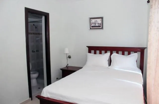 Hotel Renacer Santo Domingo room 1 large bed