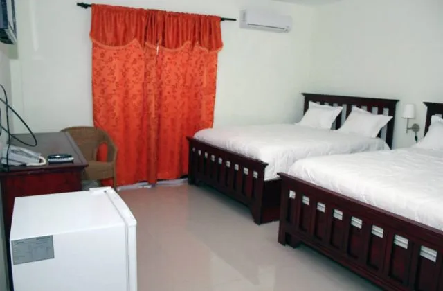 Hotel Renacer Santo Domingo room 2 large bed
